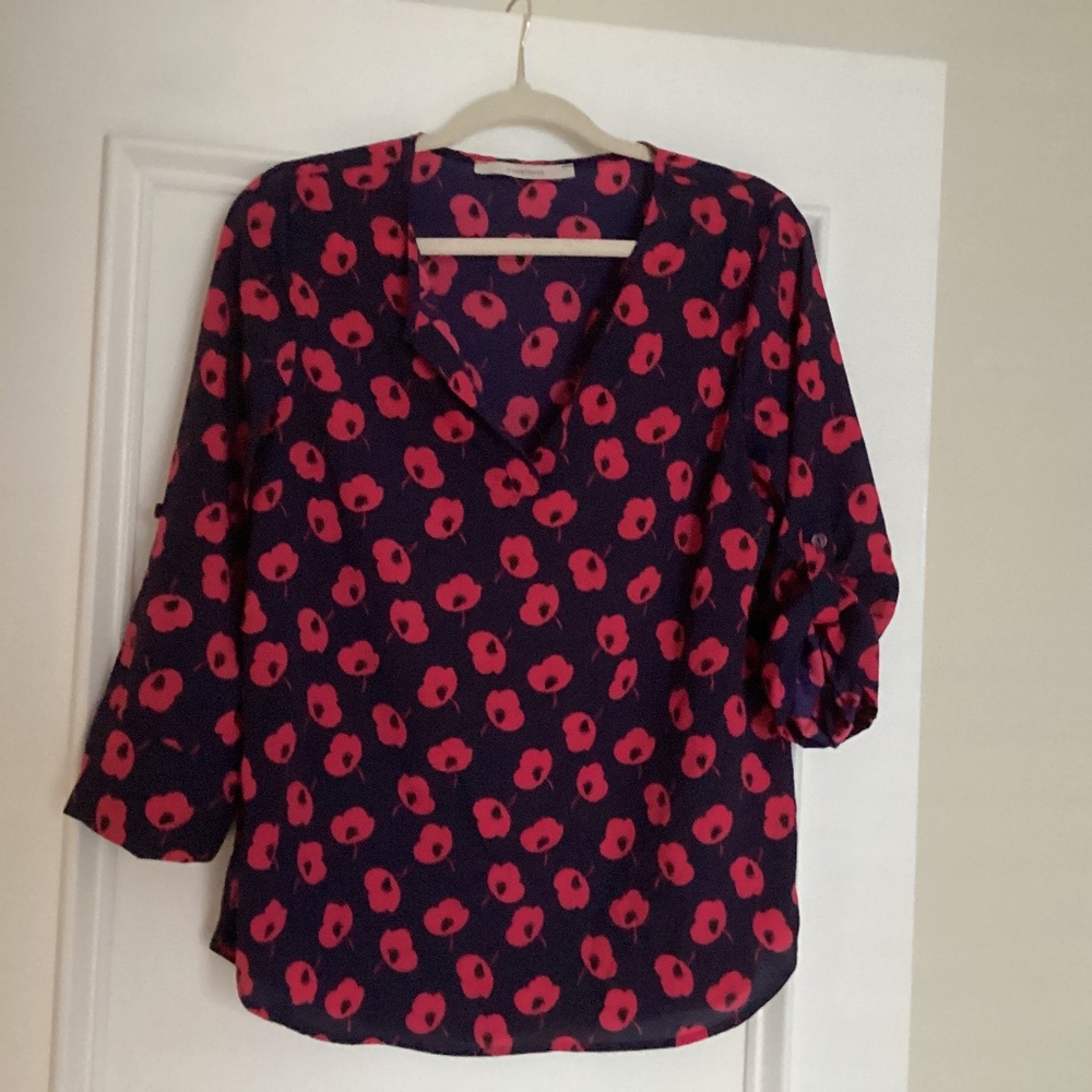 Stitch Fix brand 41 Hawthorne brand feminine blouse.